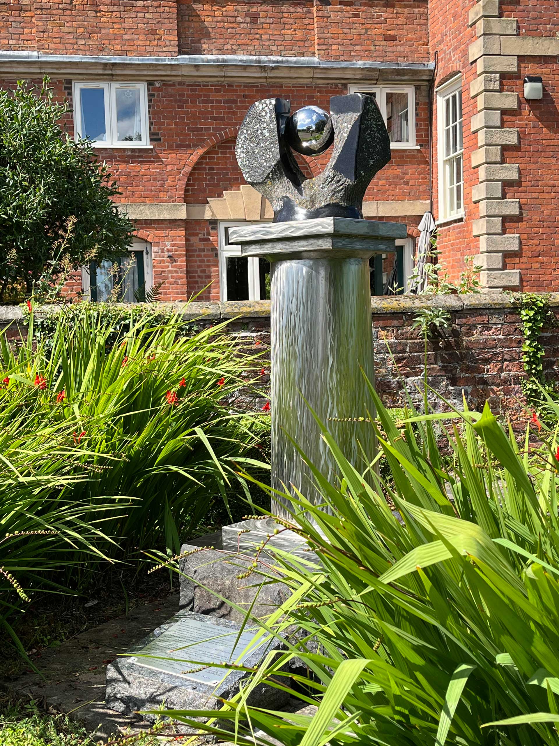 Millington's Monument: Black granite, stainless steel. Shrewsbury