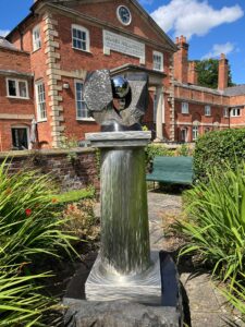 Millington's Monument: Black granite, stainless steel. Shrewsbury